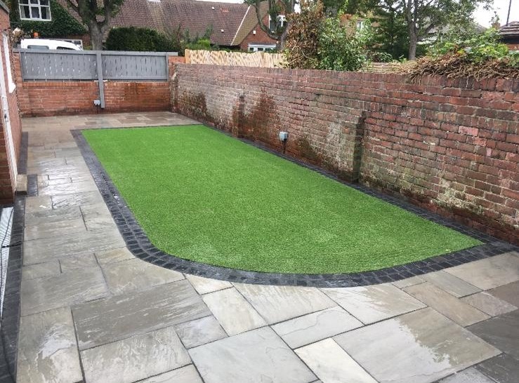 Finished patio and artificial lawn