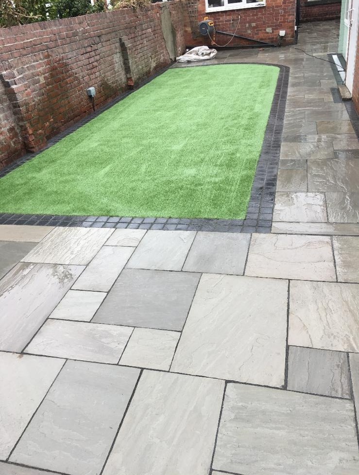 Finished paved patio and lawn